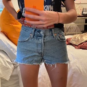 Levi’s denim shorts with hole punches on side